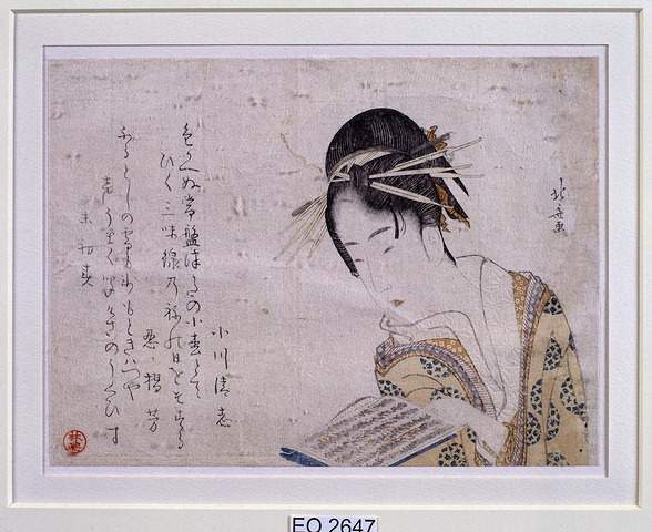 Geisha reading a book