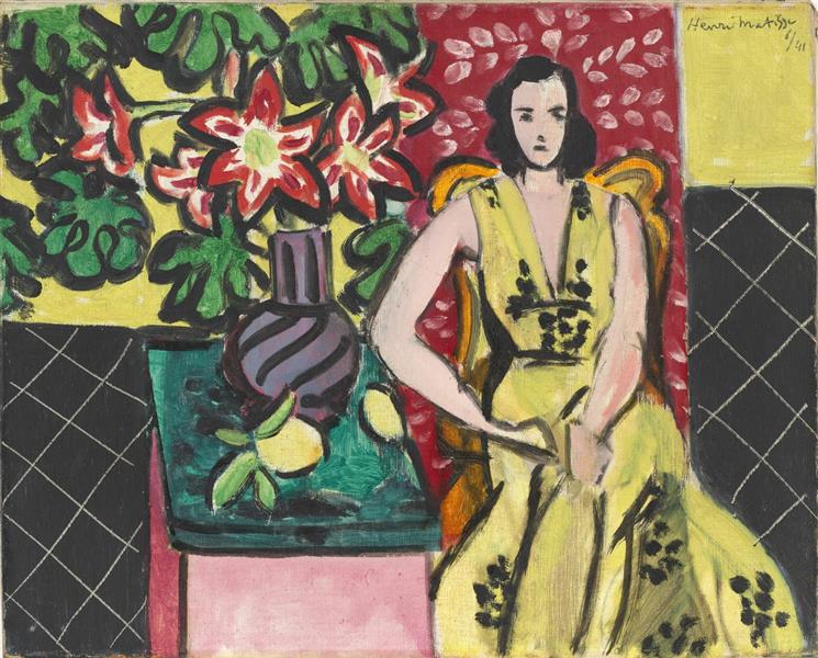 Femme assise avec un vase d'amaryllis 1941