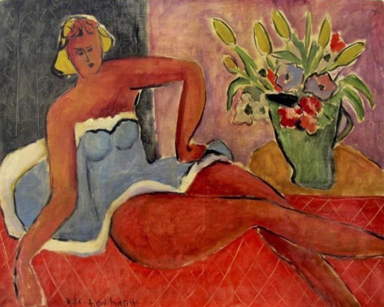 Femme allongée près d'un vase de fleurs 1942