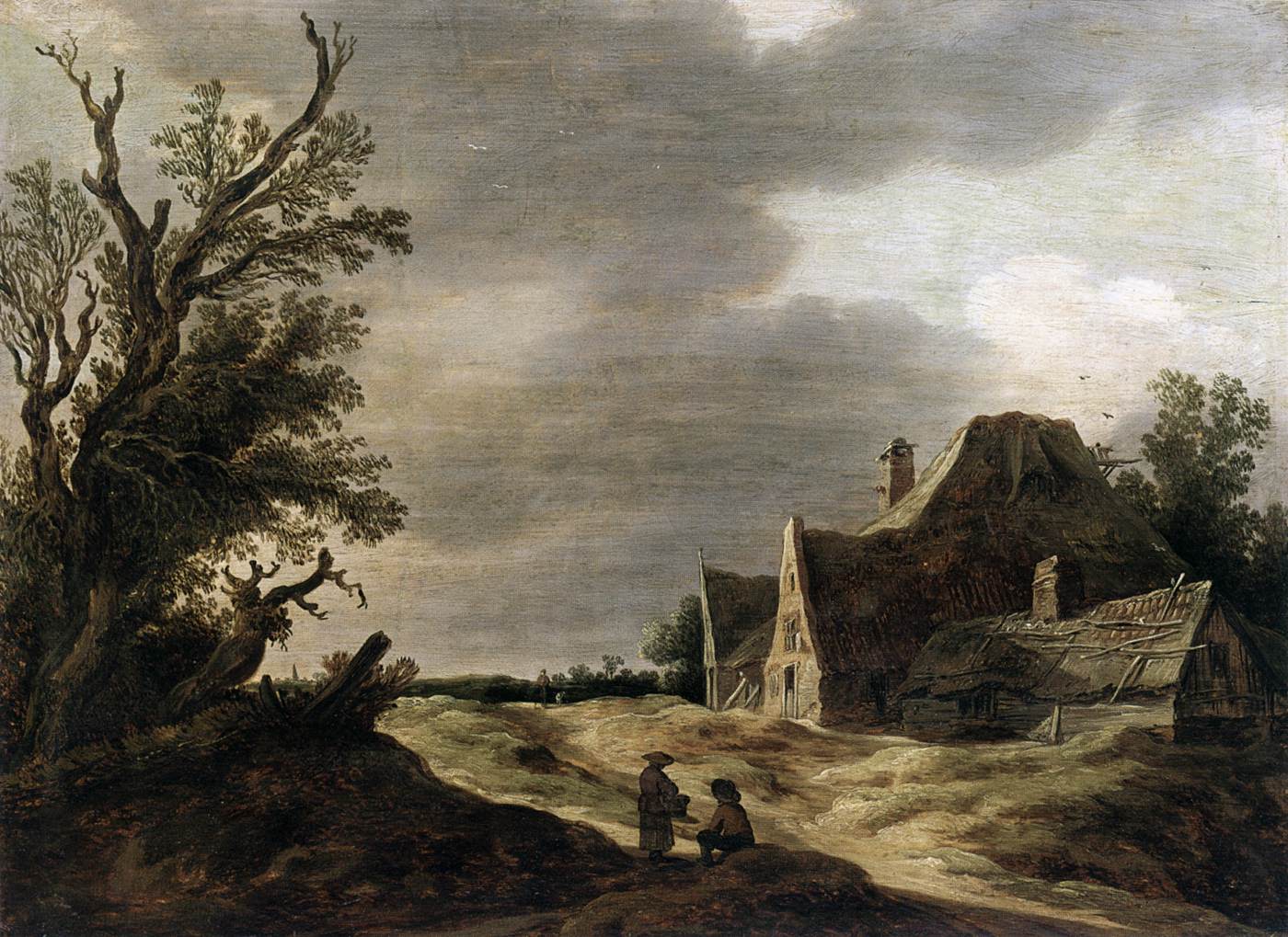 Route de sable avec une ferme
