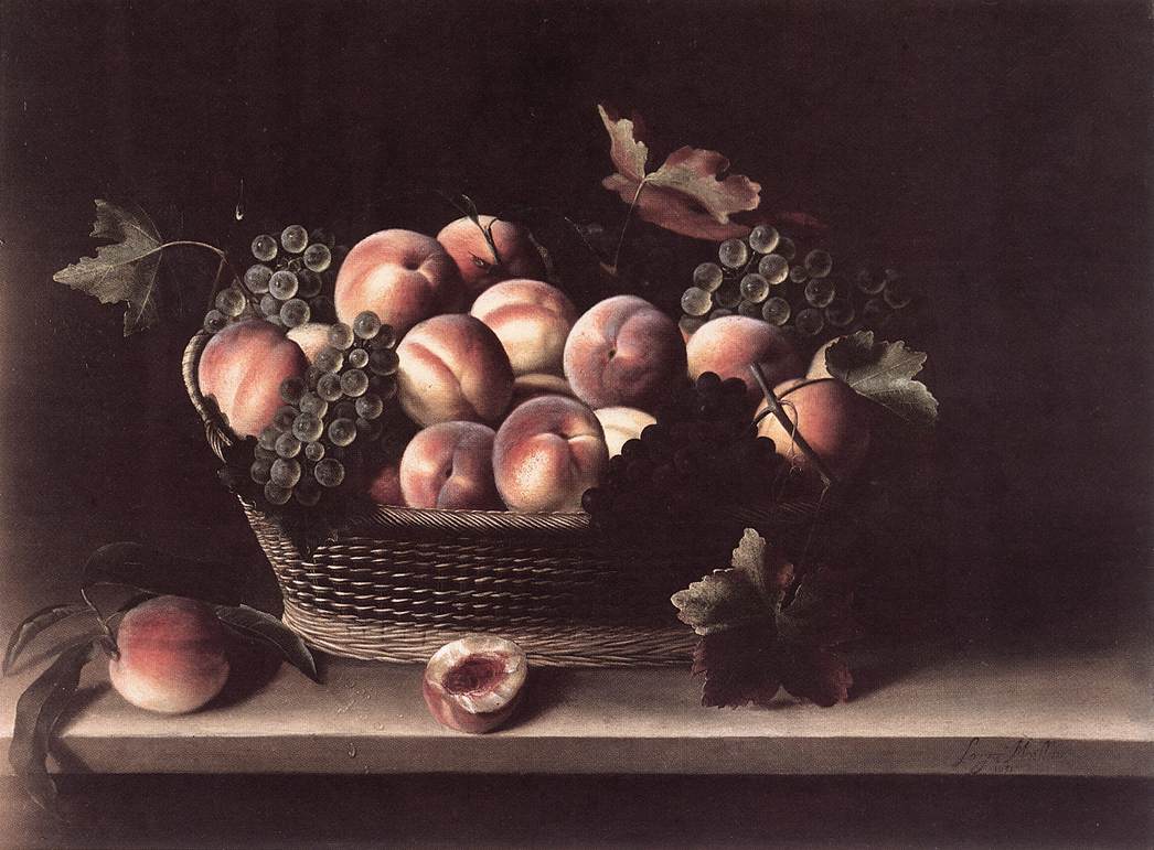 Panier avec pêches et raisins