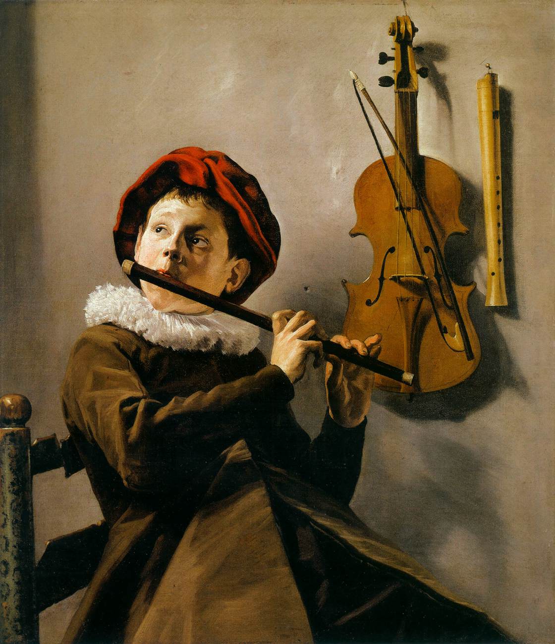 Chico Tocando una Flauta