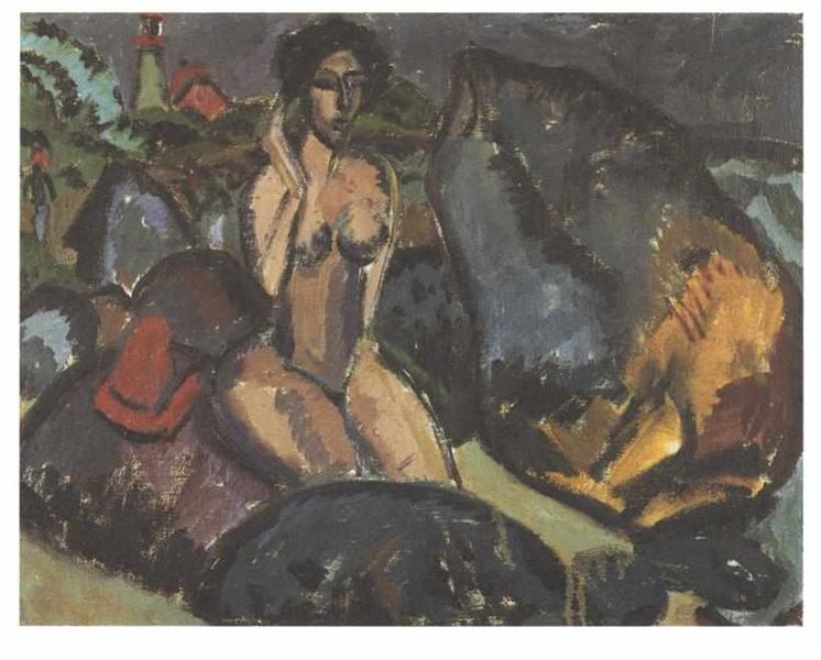 Woman bathing between rocks