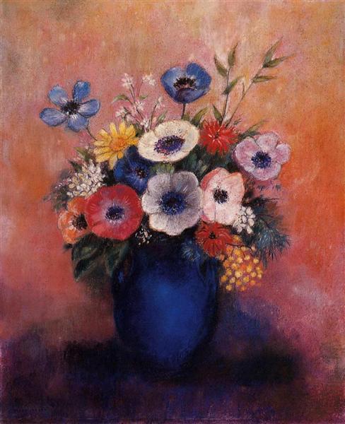 Bouquet of flowers in a blue vase.