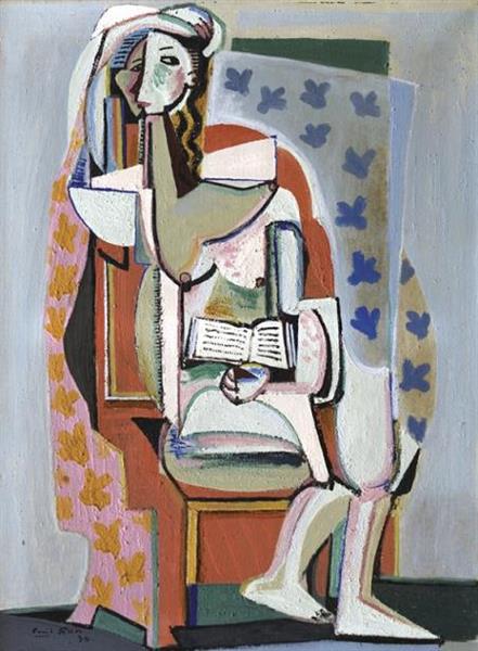 Woman in an armchair with a book