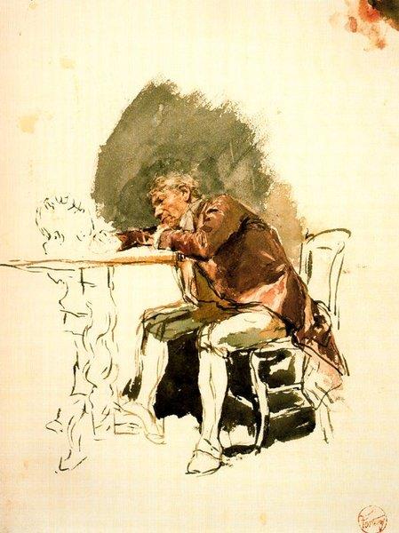 Sitting man near a table