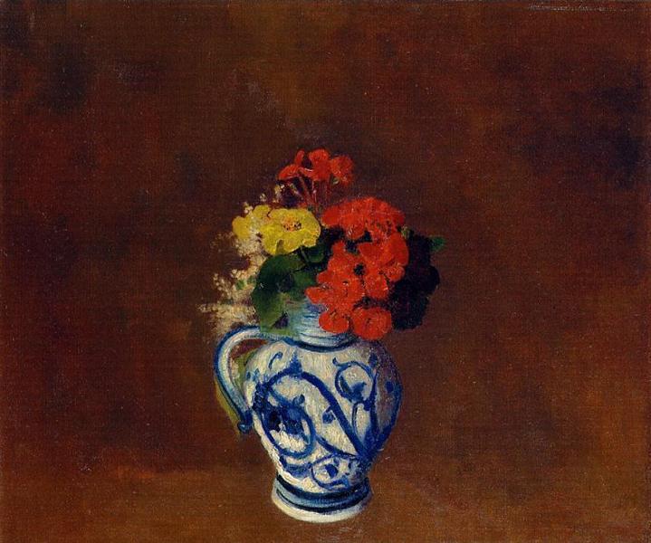 Geraniums and other flowers in a stoneware vase