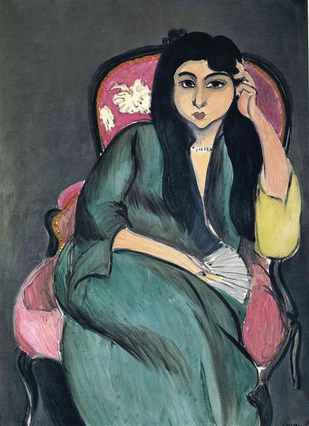 Laurette in green on a pink chair 1917 