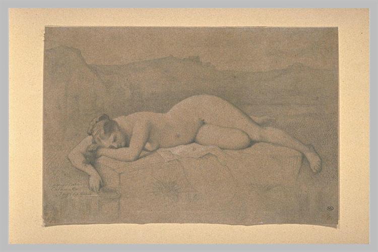 Naked woman lying on a rock