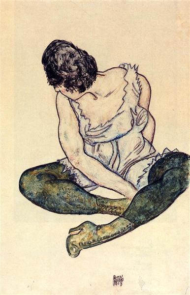 Woman sitting with green socks - 1918