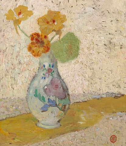 Tre blomster i en vase