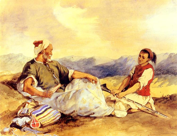 Two Moroccans sitting in the field.