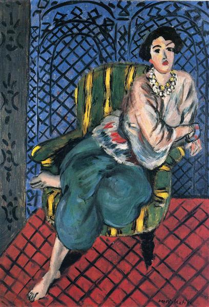 Woman sitting in a chair 1926 