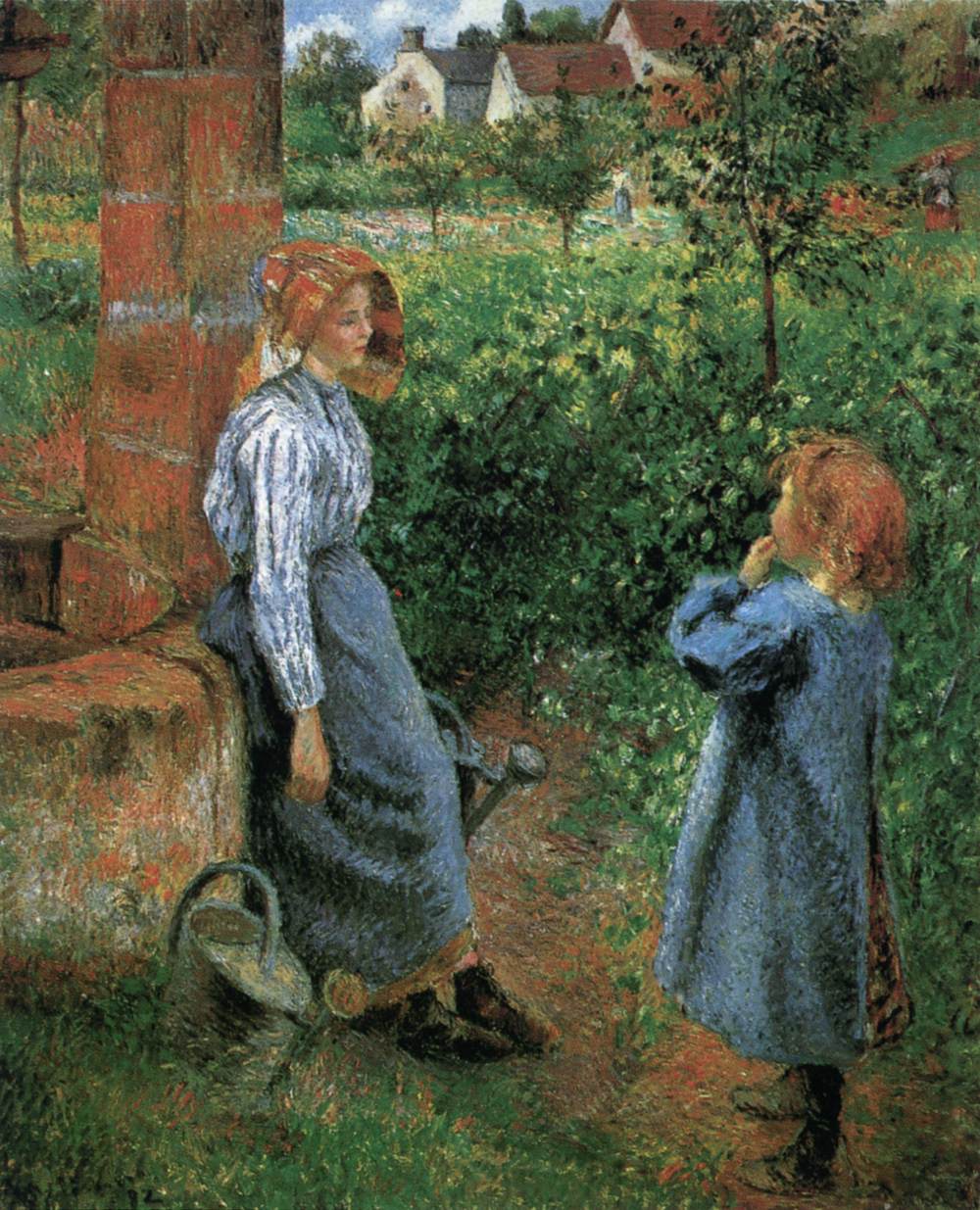 Femme et enfants dans un puits