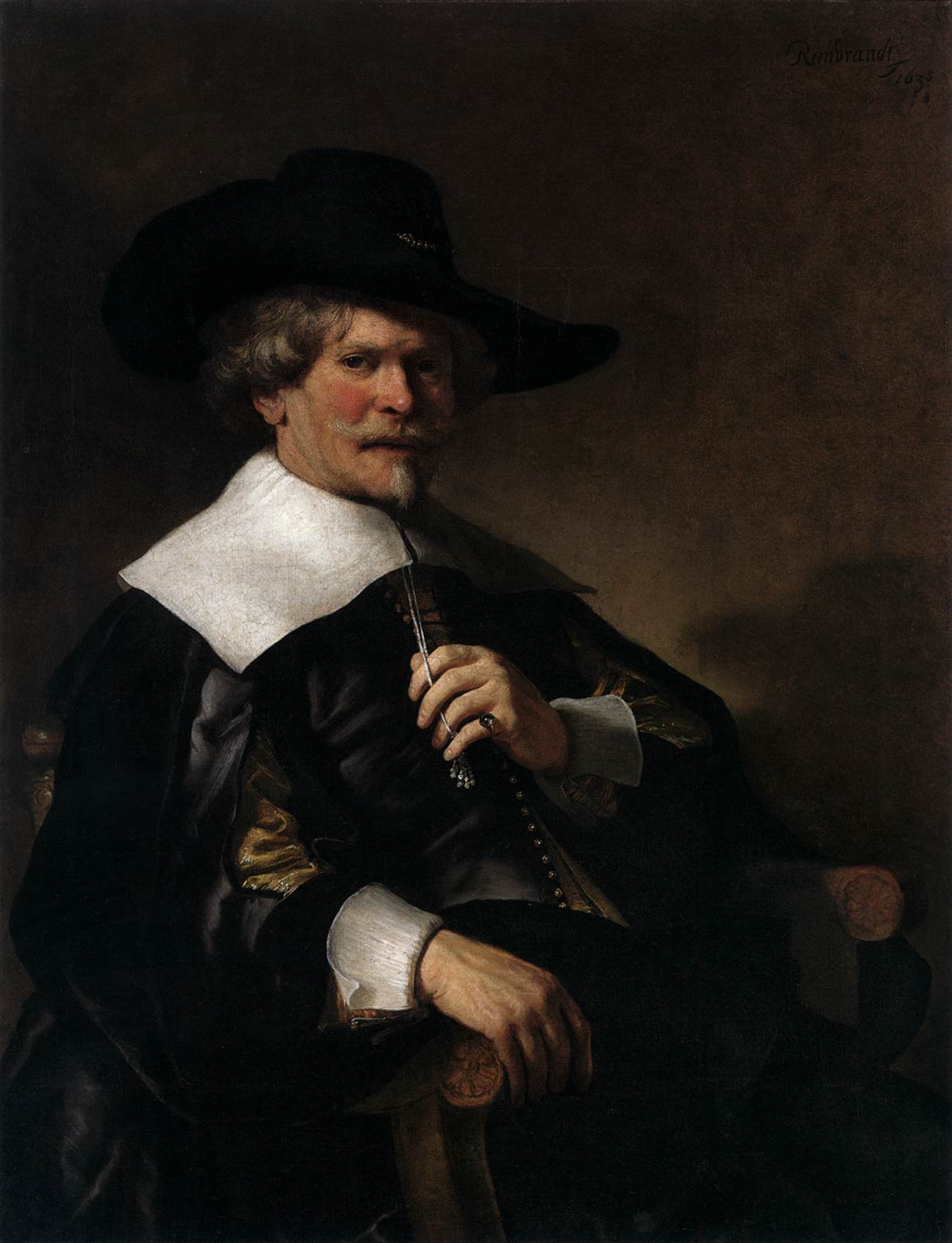 Portrait of a Man Sitting in an Armchair