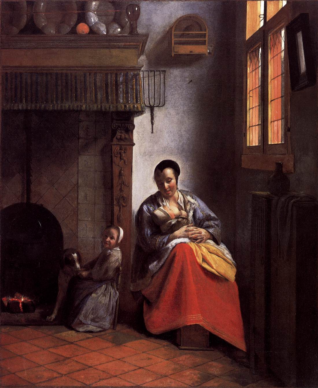 A Woman Caring for a Baby with a Child and a Dog