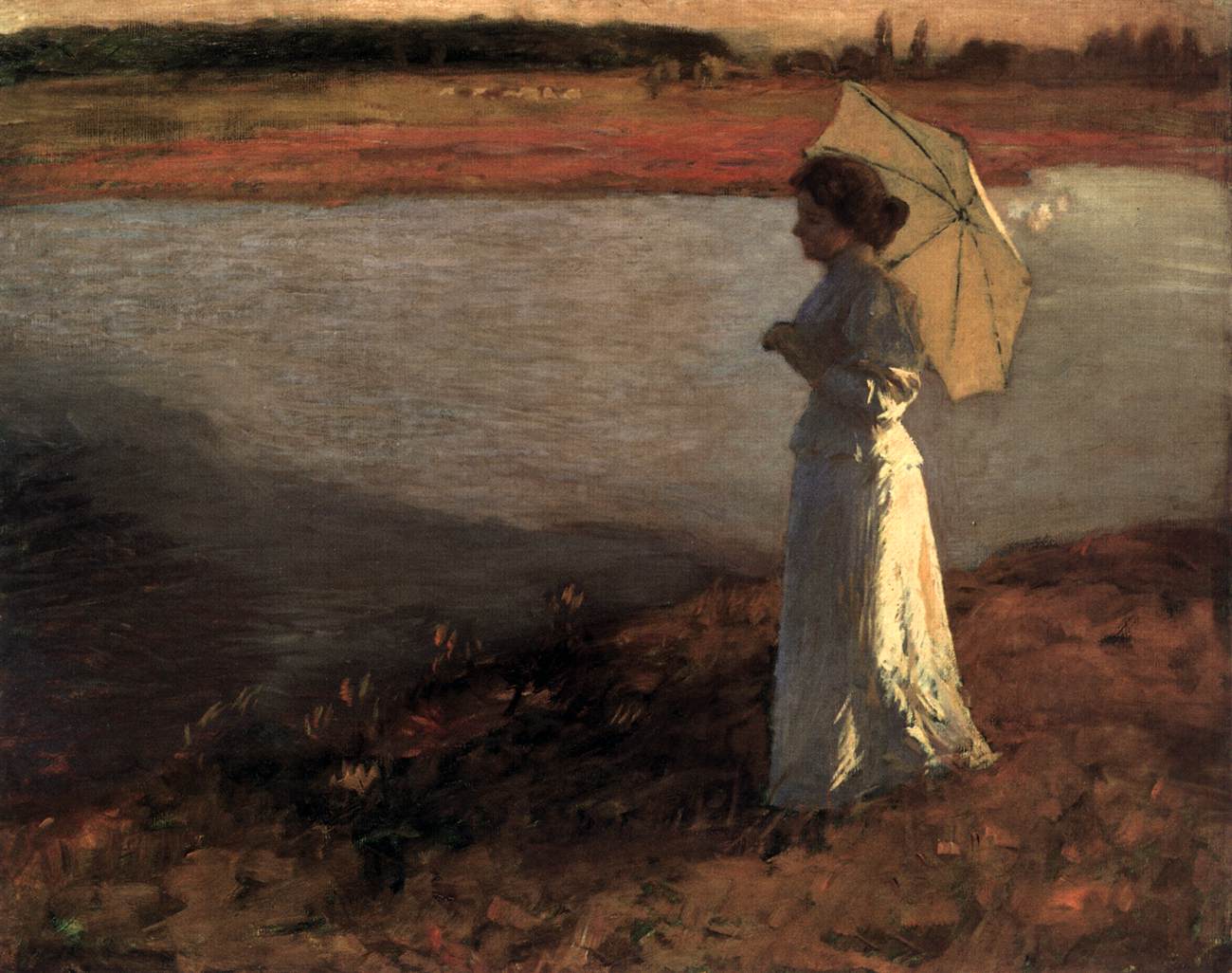 Femme à côté de l'eau