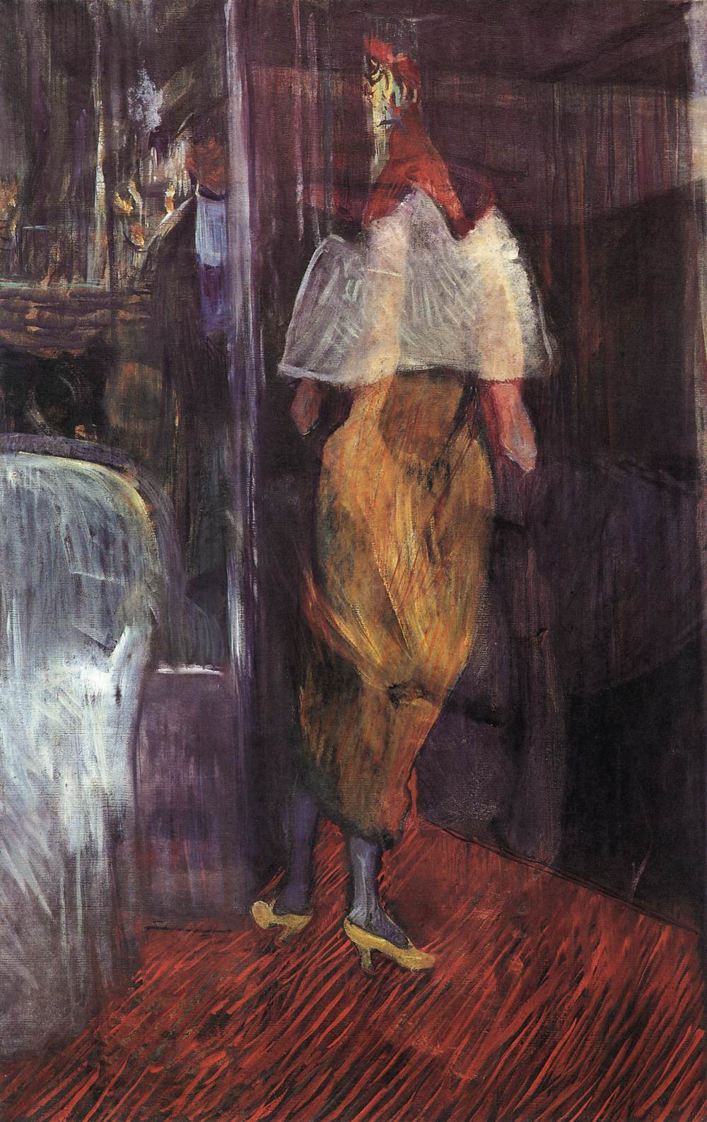 Femme à robe de nuit à la porte d'une boîte de théâtre