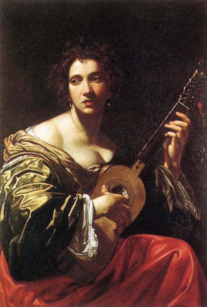 Femme jouant de la guitare