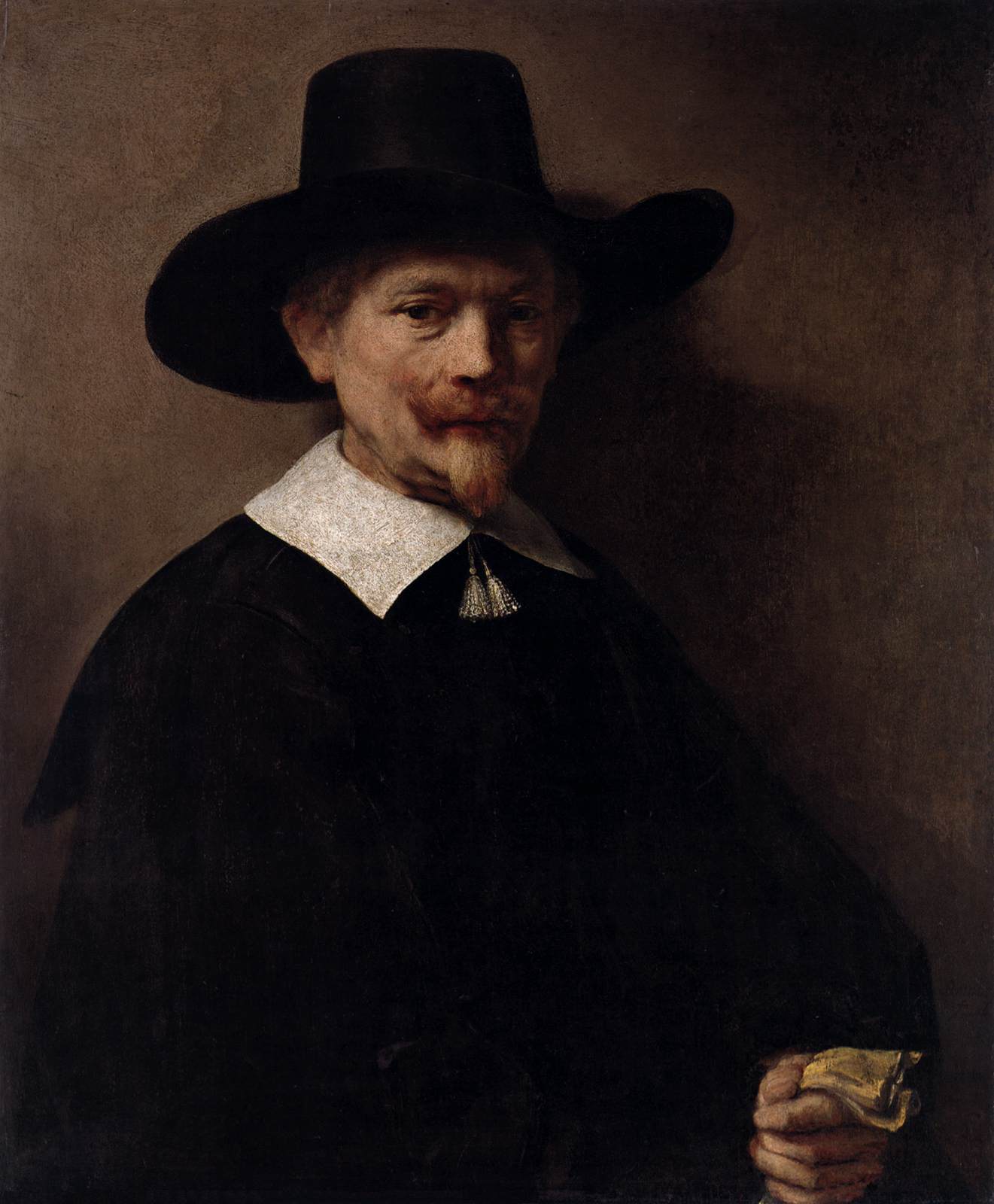 Portrait of a Man Holding Gloves