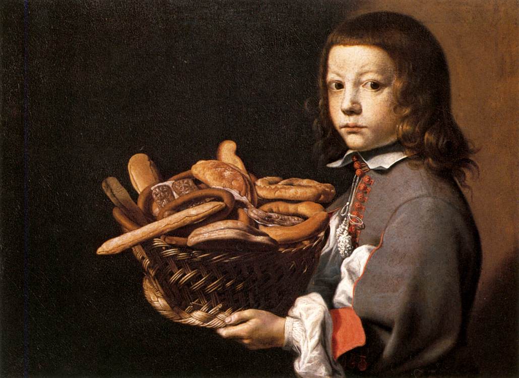 Garçon avec une panier à pain
