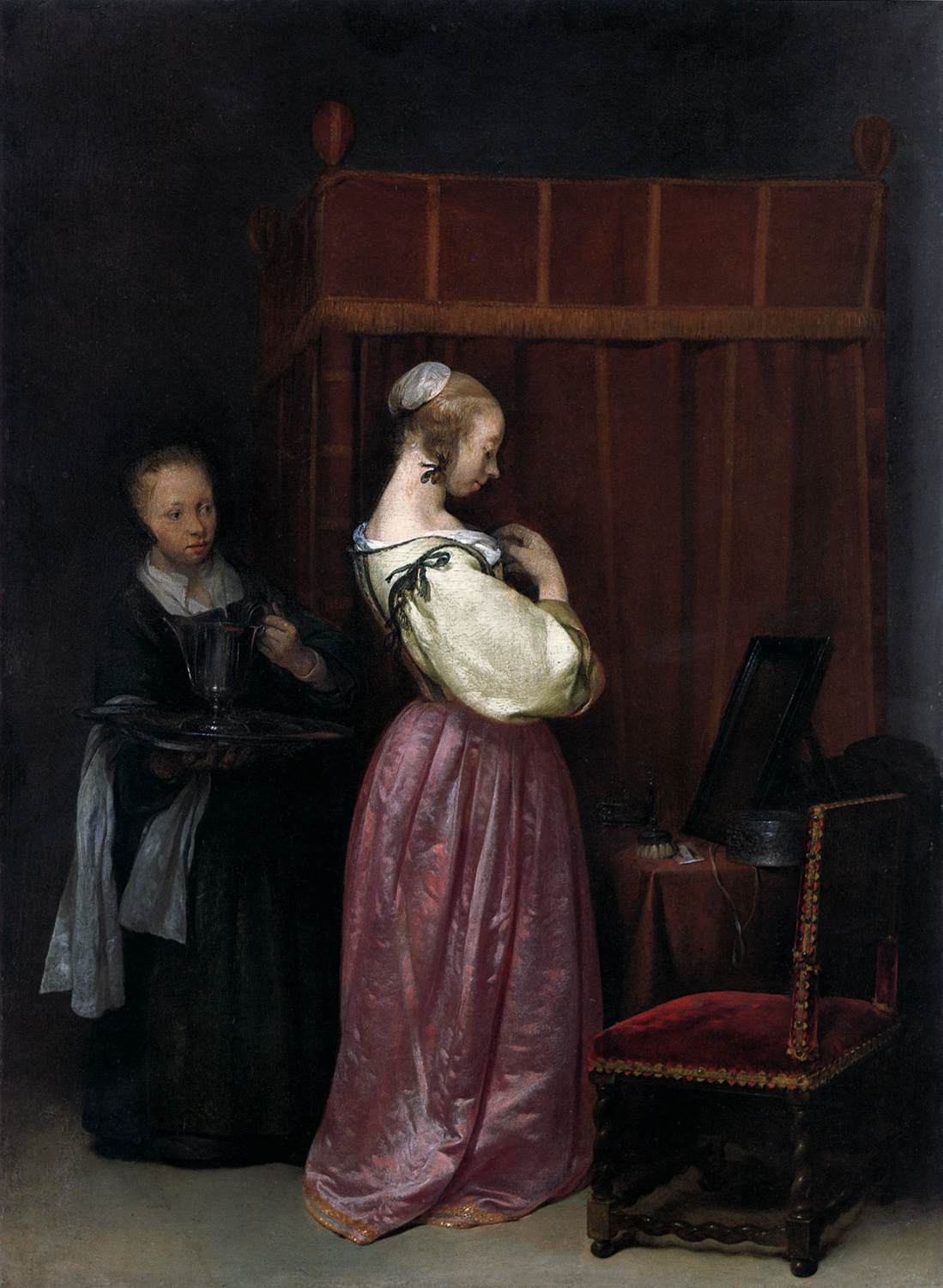 Junge Frau in ihrem Badezimmer mit einer Dienstmädchen