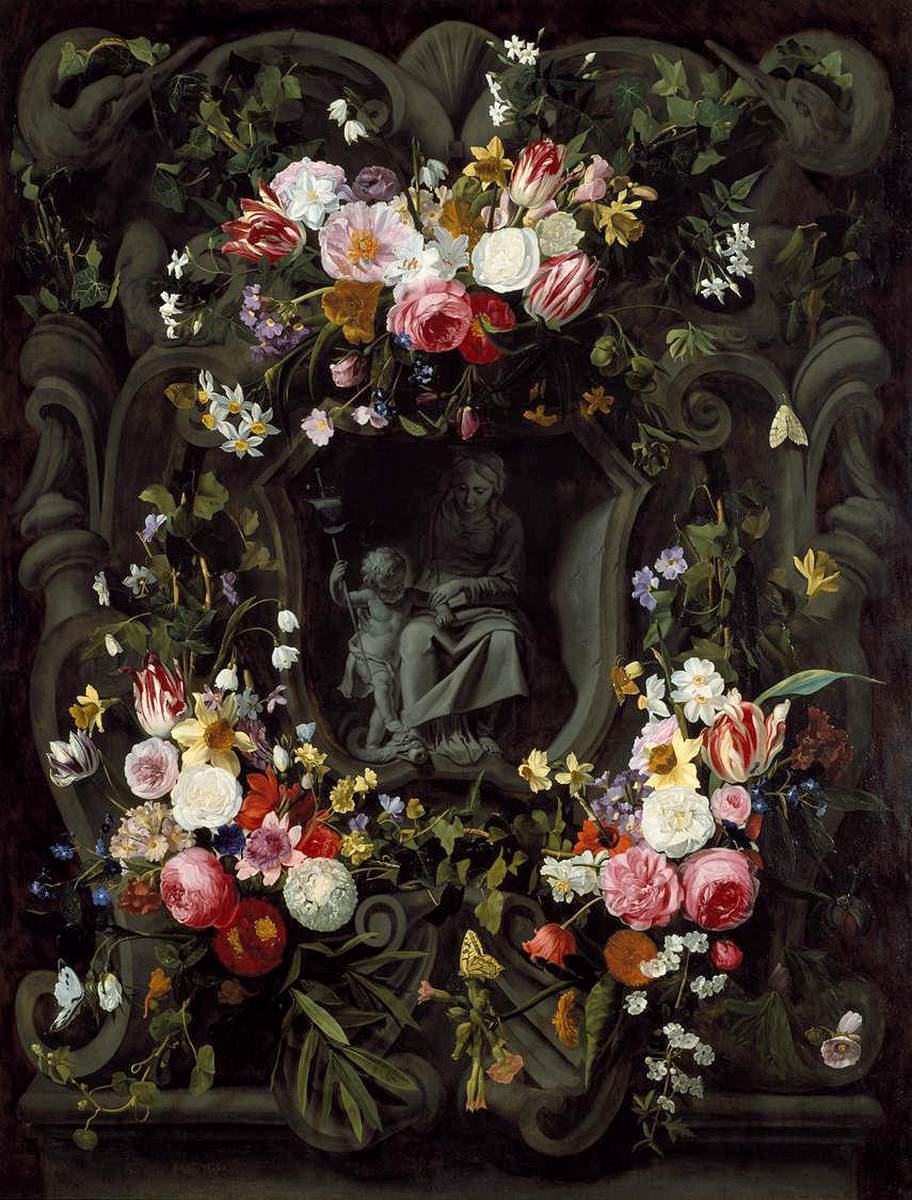 Eine Steinpatrone mit der Jungfrau und dem Kind, umgeben von einer Blumengirlande