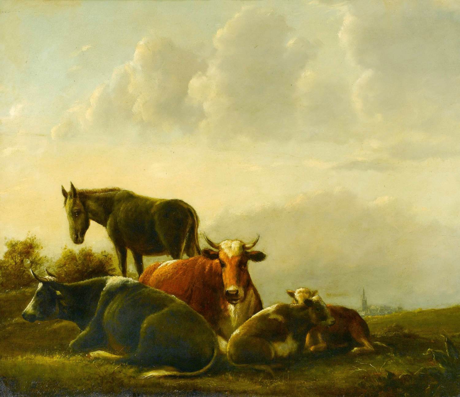 Nötkreatur och en åsna i ett landskap