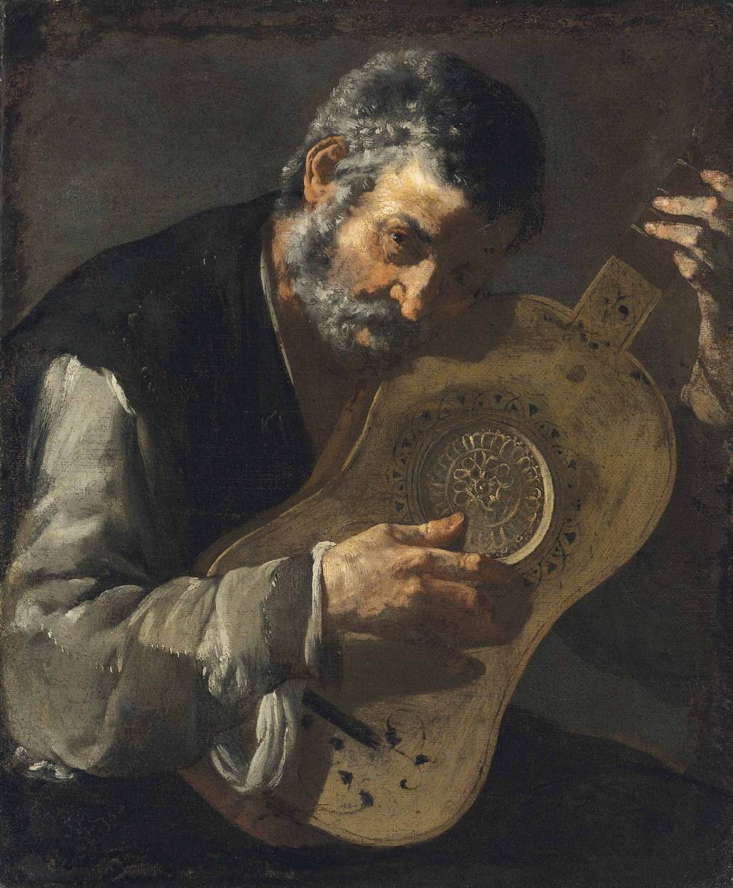 A man playing the guitar