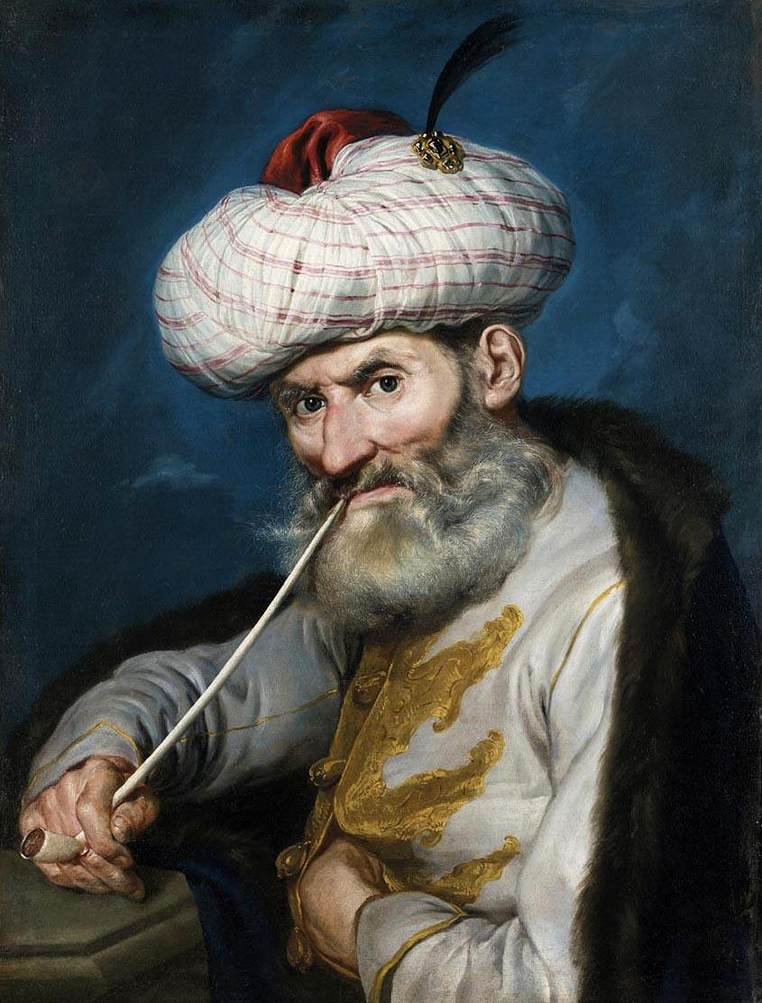 Portrait d'un homme fumeur dans l'habitude orientale
