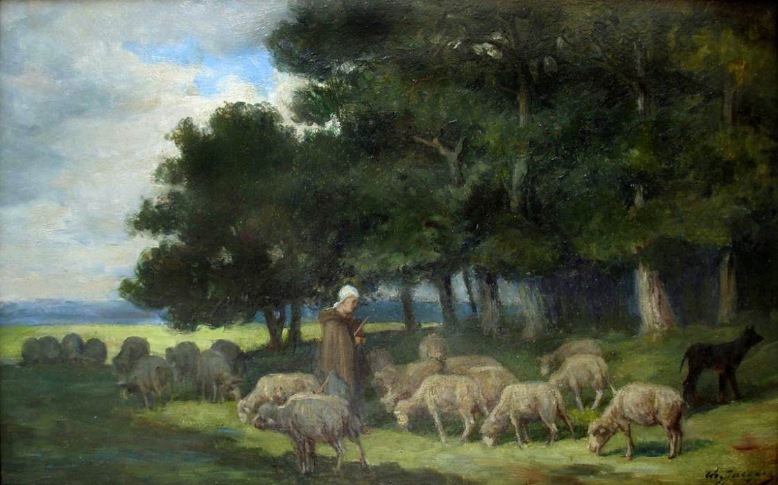 Berger et moutons sur le bord de la forêt