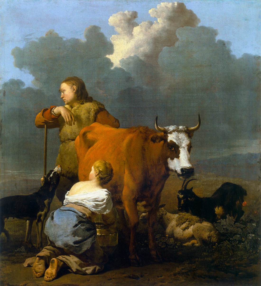 Femme traire une vache rouge