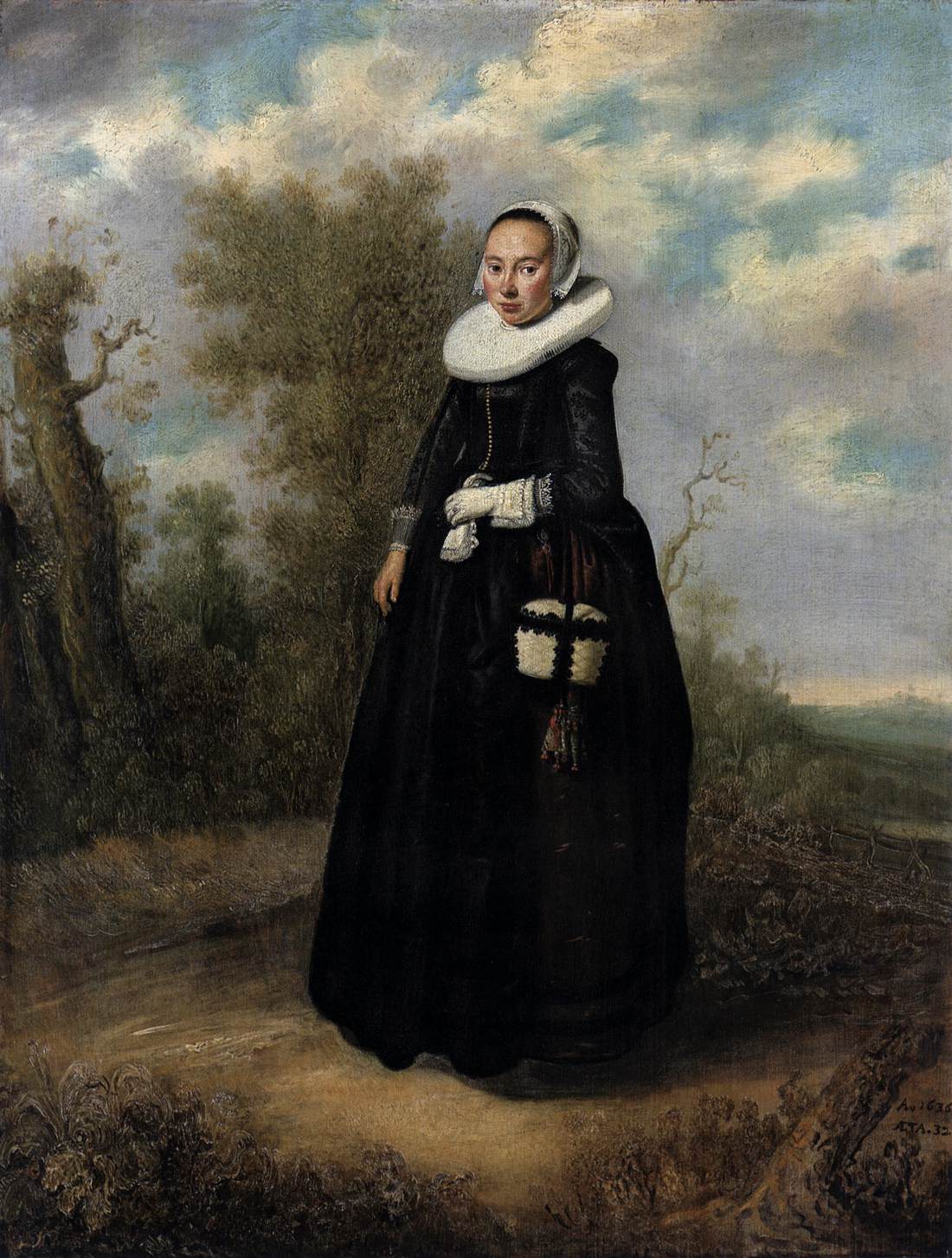 Eine junge Frau in einer Landschaft